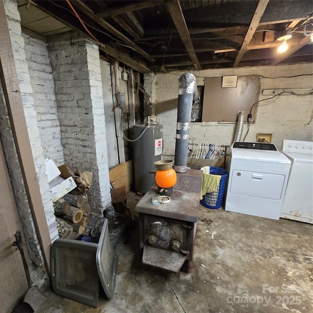 127 Hibriten Mountain Rd, Lenoir, NC 28645 - unfinished below grade area featuring electric water heater and independent washer and dryer