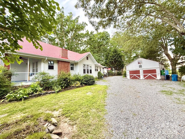5188 Dysartsville Rd, Morganton, NC 28655 - view of front of home featuring a barn, an outbuilding, a chimney, a garage, and a front lawn