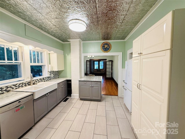 5188 Dysartsville Rd, Morganton, NC 28655 - kitchen featuring stainless steel dishwasher, gray cabinets, an ornate ceiling, light countertops, and tasteful backsplash