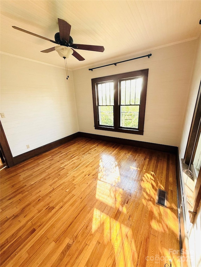 5188 Dysartsville Rd, Morganton, NC 28655 - empty room with light wood-type flooring, ceiling fan, and crown molding