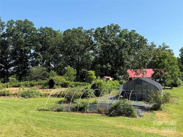 5188 Dysartsville Rd, Morganton, NC 28655 - view of grassy yard featuring a garden