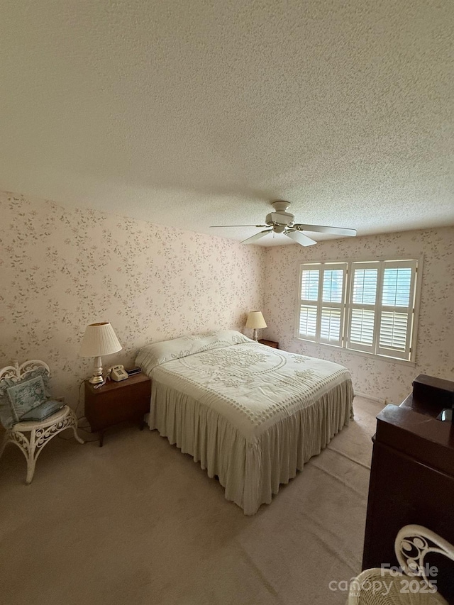 200 Breslin St, Wadesboro, NC 28170 - bedroom with wallpapered walls, light colored carpet, a textured ceiling, and a ceiling fan