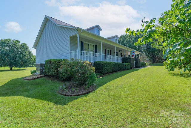 5211 Spring Gln, York, SC 29745 - view of home's exterior with covered porch and a lawn