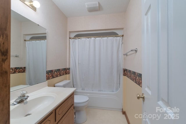 5211 Spring Gln, York, SC 29745 - bathroom with vanity, shower / bath combo with shower curtain, and a textured ceiling