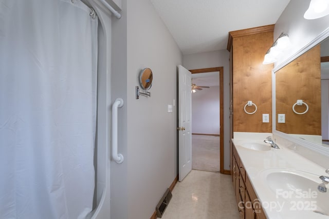 5211 Spring Gln, York, SC 29745 - bathroom featuring double vanity, shower / bathtub combination with curtain, a textured ceiling, and ceiling fan