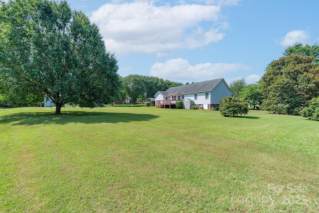 5211 Spring Gln, York, SC 29745 - view of green lawn with a wooden deck
