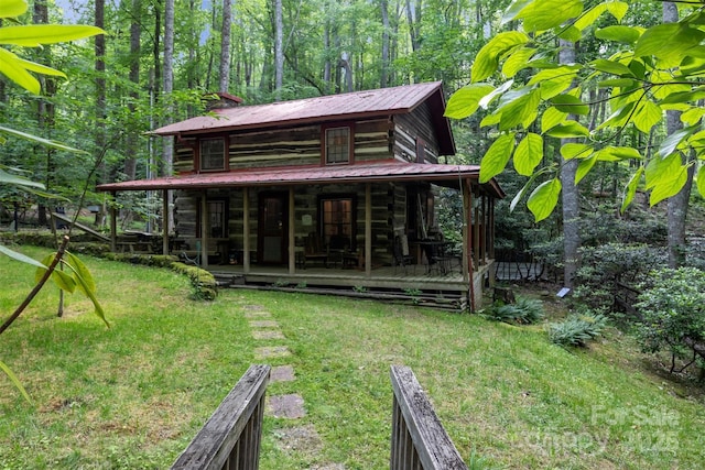 189 Woodstock Dr, West Jefferson, NC 28694 - back of house with a yard and a metal roof