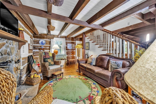 189 Woodstock Dr, West Jefferson, NC 28694 - living room with wood finished floors, stairs, and beam ceiling