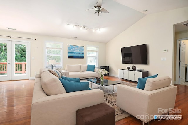 29 Honey Hollow Ln, Fairview, NC 28730 - living room with wood finished floors, a ceiling fan, vaulted ceiling, french doors, and rail lighting