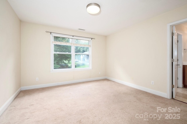 29 Honey Hollow Ln, Fairview, NC 28730 - spare room featuring light carpet and baseboards
