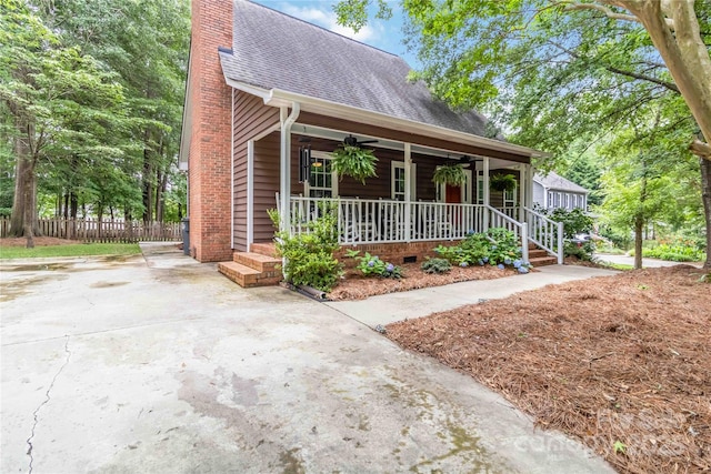 3092 Hitching Post Ln, Rock Hill, SC 29732 - view of front of home with covered porch, a shingled roof, a chimney, and driveway