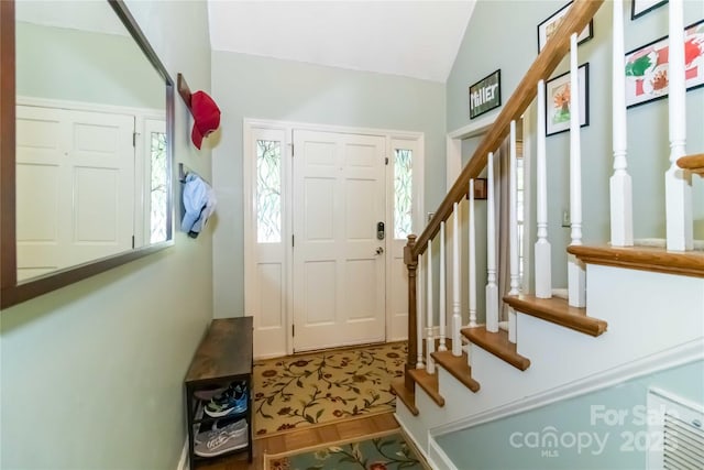 3092 Hitching Post Ln, Rock Hill, SC 29732 - entrance foyer with stairs, vaulted ceiling, and wood finished floors