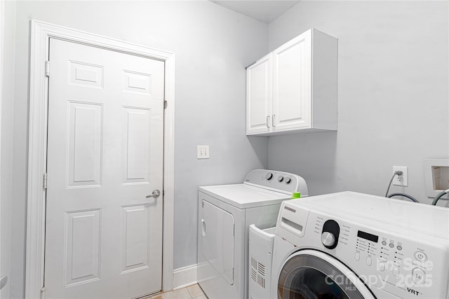 4605 Sarandon Ct, Charlotte, NC 28215 - laundry room with cabinet space and washing machine and clothes dryer