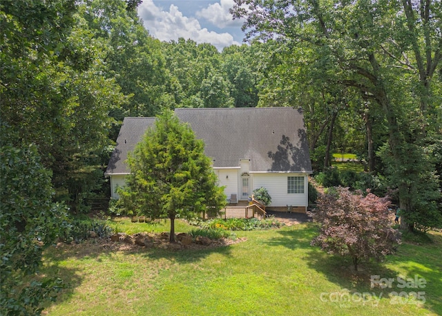 4605 Sarandon Ct, Charlotte, NC 28215 - view of side of property with a yard, a deck, and a shingled roof