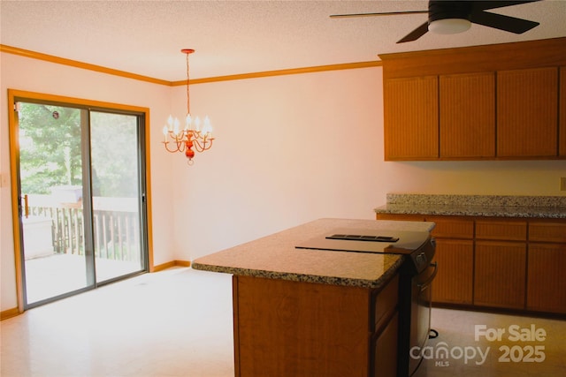 3664 Gaston Day School Rd, Gastonia, NC 28056 - kitchen featuring black electric range, a kitchen island, ceiling fan, a chandelier, and pendant lighting