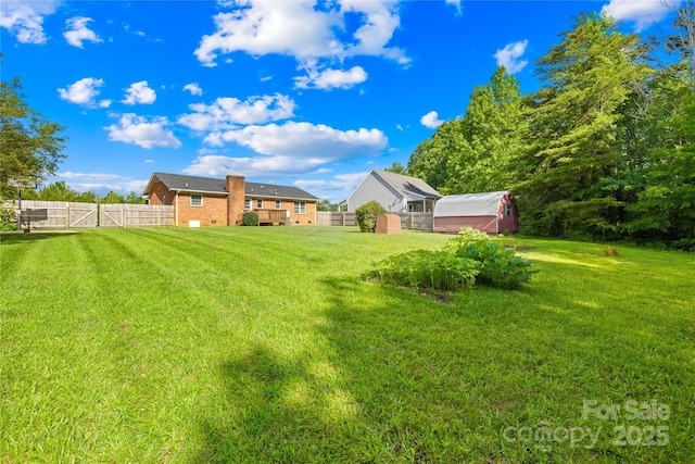 13715 Mayes Rd, Huntersville, NC 28078 - view of yard with a storage unit