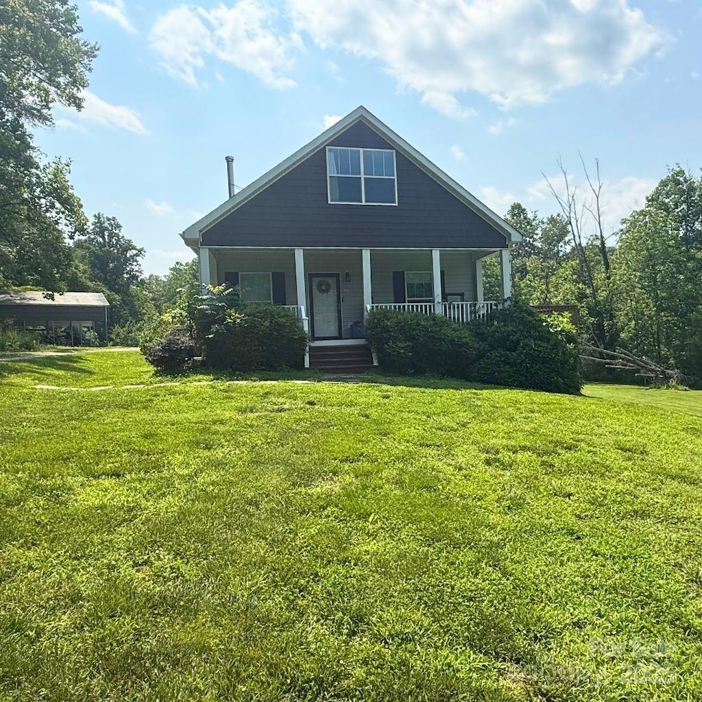 3659 Vashti Rd, Taylorsville, NC 28681 - view of front of house featuring a front lawn and a porch