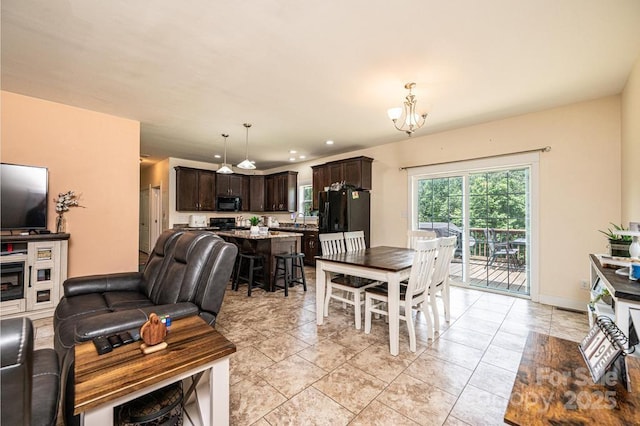 3659 Vashti Rd, Taylorsville, NC 28681 - living area featuring a chandelier and baseboards