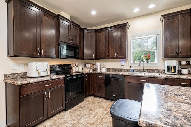3659 Vashti Rd, Taylorsville, NC 28681 - kitchen with black appliances, dark brown cabinets, stone countertops, recessed lighting, and light tile patterned floors