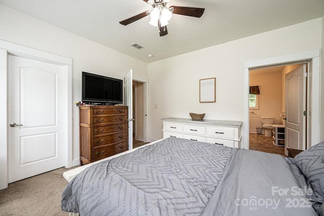 3659 Vashti Rd, Taylorsville, NC 28681 - bedroom featuring ceiling fan and ensuite bath