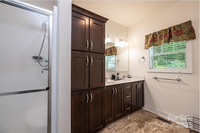 3659 Vashti Rd, Taylorsville, NC 28681 - full bath with double vanity, a shower with shower door, and tile patterned flooring