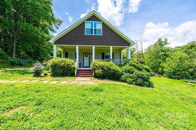 3659 Vashti Rd, Taylorsville, NC 28681 - bungalow-style house featuring covered porch and a front lawn