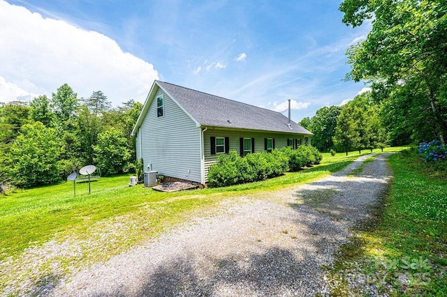 3659 Vashti Rd, Taylorsville, NC 28681 - view of side of property featuring driveway, a yard, and roof with shingles