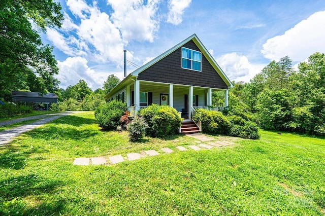 3659 Vashti Rd, Taylorsville, NC 28681 - bungalow with covered porch, a front yard, and driveway