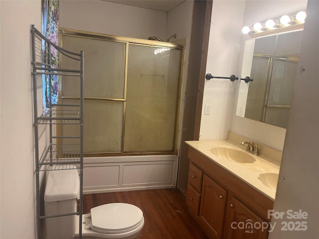 9314 Seymour Ln, Davidson, NC 28036 - full bathroom with wood finished floors, double vanity, and enclosed tub / shower combo