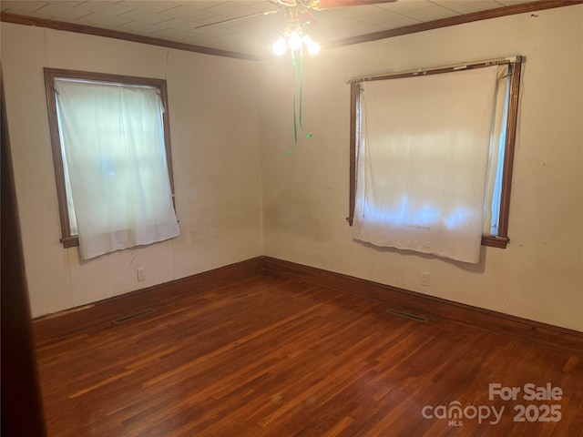 9314 Seymour Ln, Davidson, NC 28036 - spare room featuring wood finished floors, a ceiling fan, and ornamental molding