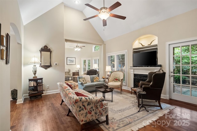 23 Tanglewood Rd, Clover, SC 29710 - living area with a ceiling fan, high vaulted ceiling, wood finished floors, plenty of natural light, and a high end fireplace