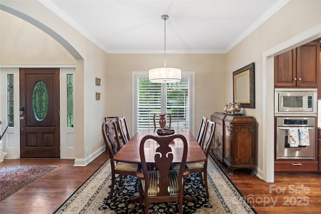 23 Tanglewood Rd, Clover, SC 29710 - dining space with dark wood finished floors, arched walkways, and crown molding