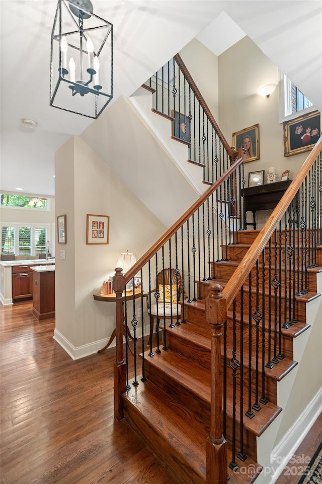 23 Tanglewood Rd, Clover, SC 29710 - stairs featuring wood finished floors and a chandelier