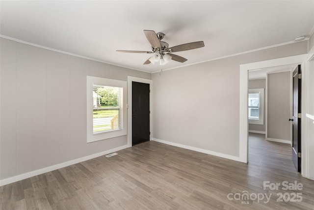 210 Marshall St, Rock Hill, SC 29730 - spare room featuring crown molding, wood finished floors, and ceiling fan