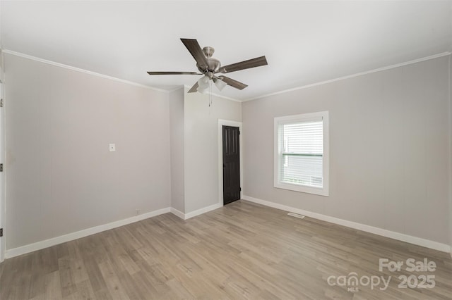 210 Marshall St, Rock Hill, SC 29730 - empty room featuring light wood-style floors, ornamental molding, and a ceiling fan