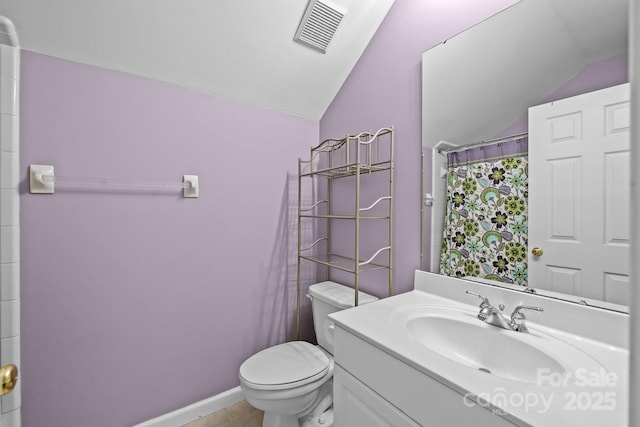 4854 S Hill View Dr, Charlotte, NC 28210 - full bathroom featuring lofted ceiling, vanity, tile patterned floors, and a shower with curtain