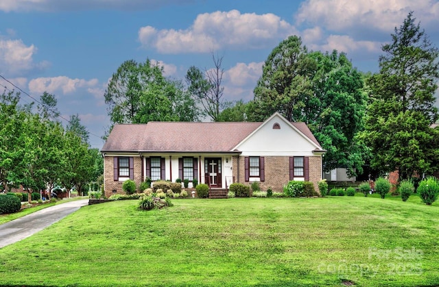 1658 Buckingham Ave, Gastonia, NC 28054 - single story home featuring brick siding, a front lawn, and concrete driveway