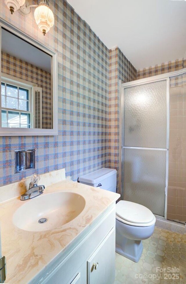 1658 Buckingham Ave, Gastonia, NC 28054 - full bathroom featuring vanity, a shower stall, and wallpapered walls