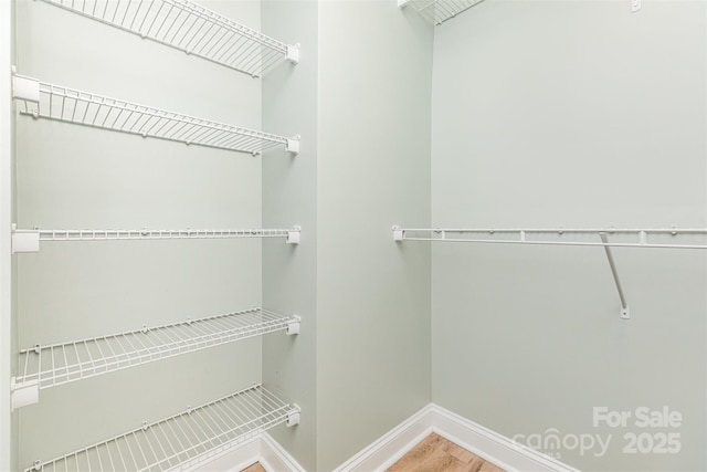 43 Paddington Dr SW, Concord, NC 28025 - spacious closet with wood finished floors