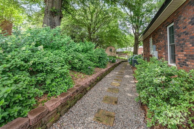 43 Paddington Dr SW, Concord, NC 28025 - view of yard with an outdoor structure