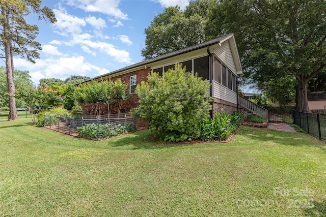 43 Paddington Dr SW, Concord, NC 28025 - view of property exterior featuring a fenced backyard, brick siding, a sunroom, and stairway
