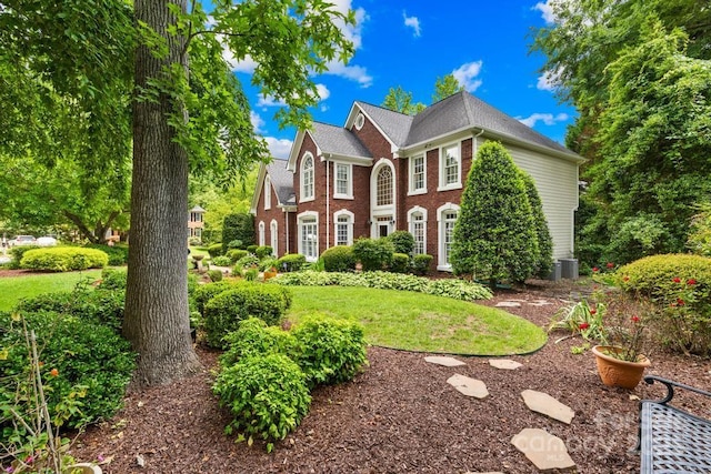 9514 Hayenridge Ct, Huntersville, NC 28078 - colonial-style house with brick siding and a front lawn