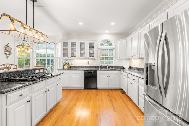 9514 Hayenridge Ct, Huntersville, NC 28078 - kitchen featuring black appliances, white cabinets, glass insert cabinets, tasteful backsplash, and crown molding