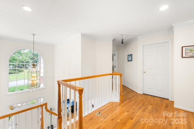 9514 Hayenridge Ct, Huntersville, NC 28078 - corridor with an upstairs landing, light wood-type flooring, ornamental molding, and recessed lighting