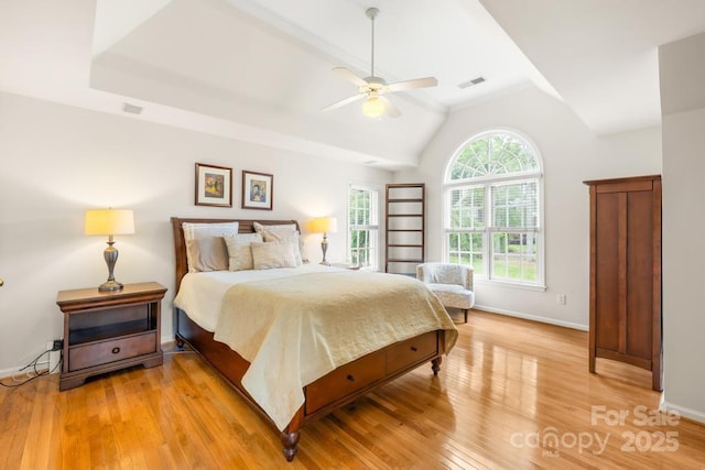 9514 Hayenridge Ct, Huntersville, NC 28078 - bedroom featuring light wood-type flooring, vaulted ceiling, and a ceiling fan