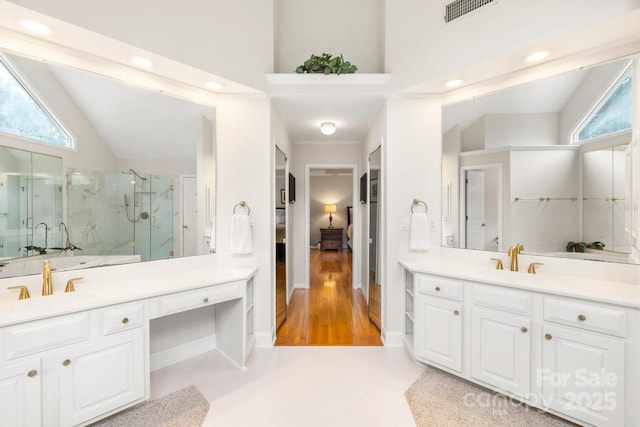 9514 Hayenridge Ct, Huntersville, NC 28078 - ensuite bathroom with a marble finish shower, two vanities, lofted ceiling, and recessed lighting