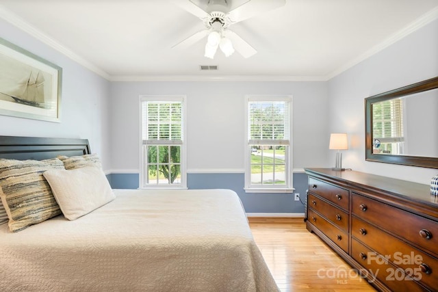 9514 Hayenridge Ct, Huntersville, NC 28078 - bedroom with light wood finished floors, crown molding, and ceiling fan
