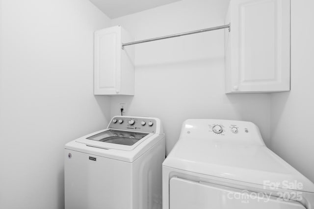 9514 Hayenridge Ct, Huntersville, NC 28078 - laundry area with washer and clothes dryer and cabinet space