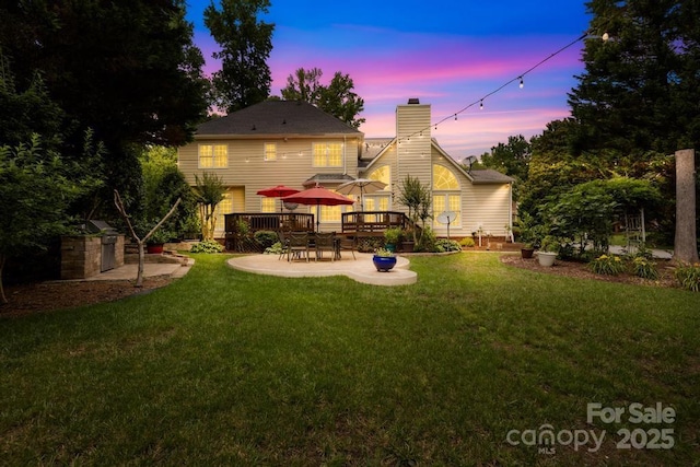 9514 Hayenridge Ct, Huntersville, NC 28078 - back of property featuring a patio, a chimney, a wooden deck, and a lawn
