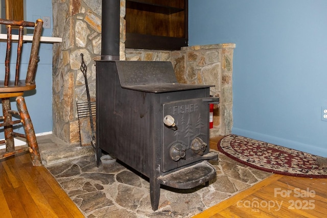 3153 US-70 Hwy E, Black Mountain, NC 28711 - detailed view of a wood stove and wood finished floors